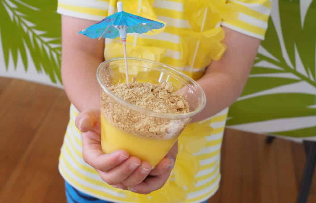 Easy Luau Ideas for Kids! Luau snack cup with umbrella inside