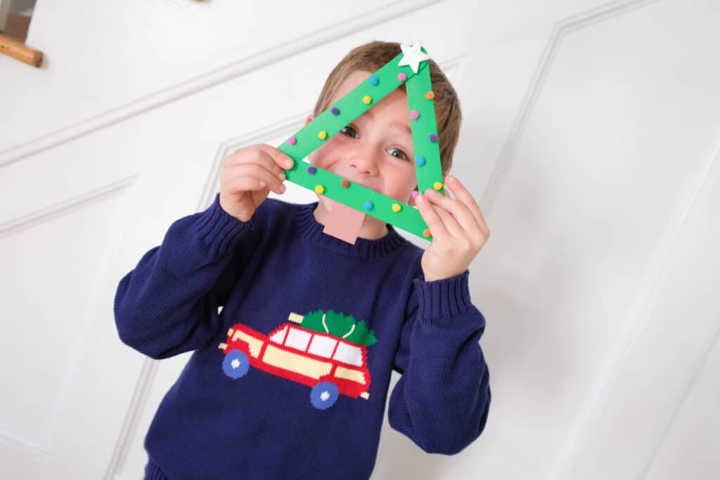 boy holding diy photo gift ideas for grandparents