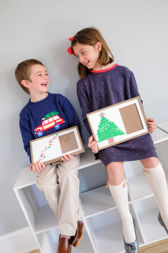 kids holding diy photo gift ideas for grandparents